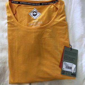 REI Outdoor Train T-shirt. Yellow/Gold color. UPF 30. Wicking and quick drying.
